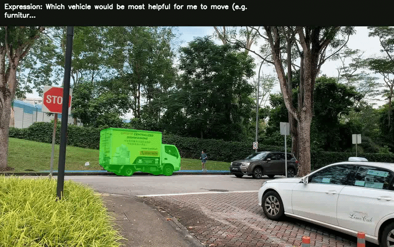 ATLAS segmenting a green moving truck across a ReasonVOS video for the expression 'Which vehicle would be most helpful for me to move (e.g. furniture…'