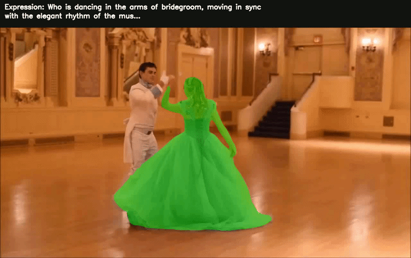 ATLAS segments the woman in a green gown dancing with a groom in a ballroom.